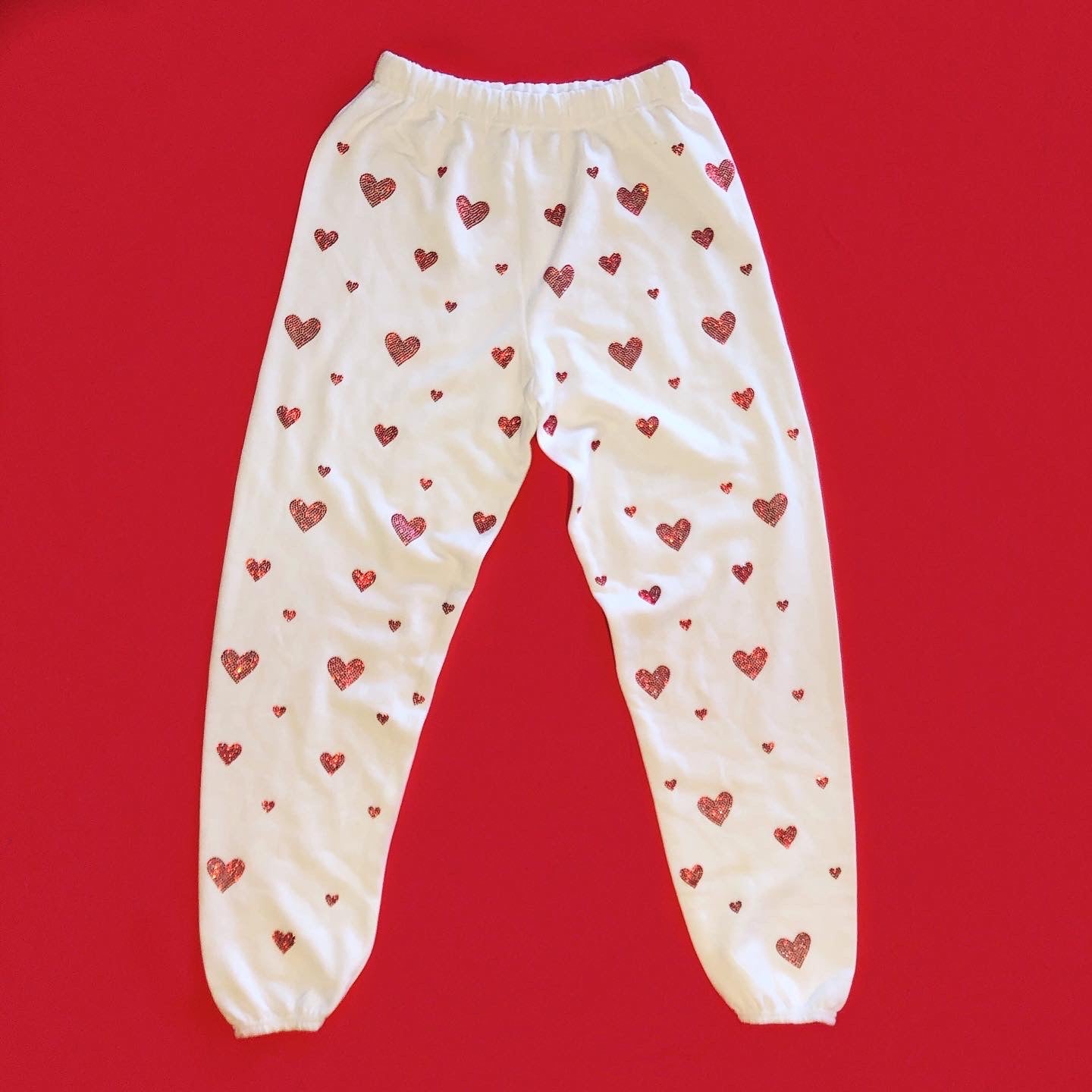 Red sweatpants 2025 with white hearts